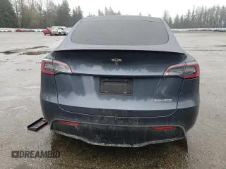 2022 Tesla Model Y Performance with VIN 7SAYGDEF2NF459268, listed as a Copart auction lot 45764735 with 64,421 mi miles and Salvage title. Bid and sale history available at DreamBid. Image 6.