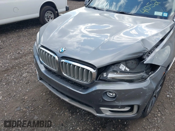 2014 BMW X5 xDrive35i with VIN 5UXKR0C52E0K50710, listed as a IAAI auction lot 40529606 with 114,307 mi miles. Bid and sale history available at carsss.com. Image 6.