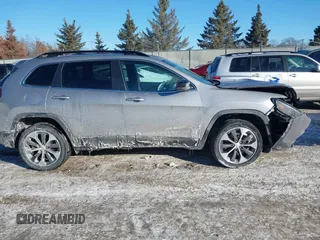 2022 Jeep Cherokee Limited z VIN 1C4PJMDX4ND513178, wystawiony jako IAAI lot #41636443 z przebiegiem 59 635 mil mil oraz . Historia ofert i sprzedaży dostępna na DreamBid. Obrazek 13.