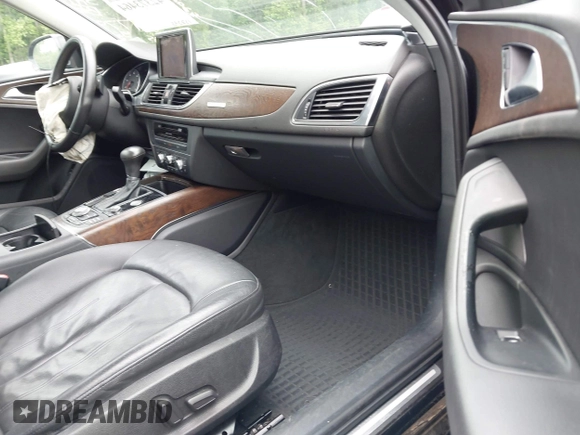 2013 Audi A6 Premium Plus with VIN WAUGFAFC4DN131779, listed as a IAAI auction lot 42373464 with 133,505 mi miles and . Bid and sale history available at DreamBid. Image 5.