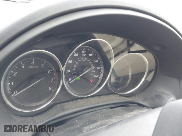 2014 Mazda CX-5 Touring with VIN JM3KE2CY4E0411780, listed as a IAAI auction lot 41903570 with 103,658 mi miles and . Bid and sale history available at DreamBid. Image 7.