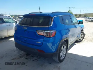 2022 Jeep Compass Latitude with VIN 3C4NJCBB7NT119404, listed as a IAAI auction lot 41846502 with 51,483 mi miles and . Bid and sale history available at carsss.com. Image 4.