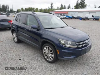 2016 Volkswagen Tiguan SE z VIN WVGBV7AX1GW511394, wystawiony jako IAAI lot #42225201 z przebiegiem 151 056 mil mil oraz . Historia ofert i sprzedaży dostępna na DreamBid. Obrazek 1.