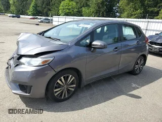 2015 Honda Fit EX-L with VIN 3HGGK5H80FM767970, listed as a Copart auction lot 55866075 with 64,435 mi miles and Salvage Title. Bid and sale history available at DreamBid. Image 1.