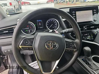 2022 Toyota Camry Hybrid LE with VIN 4T1C31AK0NU580162, listed as a IAAI auction lot 42036207 with 55,442 mi miles. Bid and sale history available at carsss.com. Image 1.