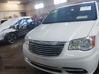 2015 Chrysler Town & Country Touring-L with VIN 2C4RC1CG9FR573653, listed as a IAAI auction lot 41839012 with 116,248 mi miles. Bid and sale history available at carsss.com. Image 12.