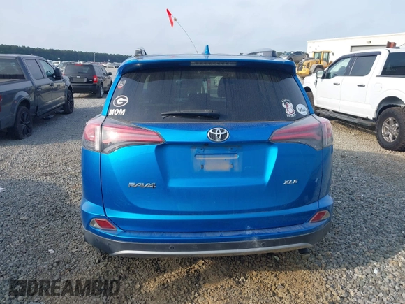 2018 Toyota RAV4 XLE with VIN JTMWFREV3JJ725847, listed as a IAAI auction lot 42110555 with 84,503 mi miles and . Bid and sale history available at DreamBid. Image 17.