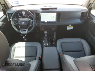 2024 Ford Bronco Big Bend with VIN 1FMDE7BH0RLB23240, listed as a Copart auction lot 52766855 with 1,283 mi miles and Salvage Title. Bid and sale history available at DreamBid. Image 8.