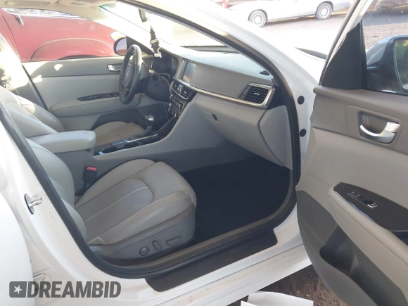 2016 Kia Optima EX with VIN 5XXGU4L30GG117411, listed as a IAAI auction lot 42034988 with 123,387 mi miles. Bid and sale history available at carsss.com. Image 5.