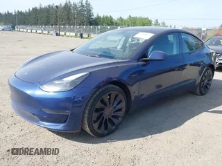 2023 Tesla Model 3 Performance with VIN 5YJ3E1EC2PF679613, listed as a IAAI auction lot 42099199 with 21,721 mi miles. Bid and sale history available at carsss.com. Image 20.