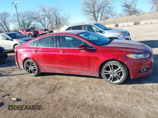 2014 Ford Fusion Titanium with VIN 3FA6P0K99ER241148, listed as a IAAI auction lot 41410796 with 217,003 mi miles. Bid and sale history available at carsss.com. Image 13.