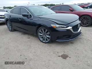 2020 Mazda 6 Touring with VIN JM1GL1VM1L1525879, listed as a IAAI auction lot 41023192 with 43,531 mi miles. Bid and sale history available at carsss.com. Image 1.