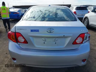 2009 Toyota Corolla with VIN 1NXBU40E39Z092092, listed as a IAAI auction lot 41881741 with 144,309 mi miles. Bid and sale history available at carsss.com. Image 16.