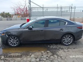 2021 Mazda 3 Preferred with VIN 3MZBPACL4MM214814, listed as a IAAI auction lot 42115140 with 28,860 mi miles and . Bid and sale history available at DreamBid. Image 14.