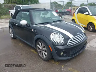 2013 MINI Convertible with VIN WMWZN3C54DT568819, listed as a IAAI auction lot 41951061 with 154,498 mi miles and . Bid and sale history available at DreamBid. Image 1.