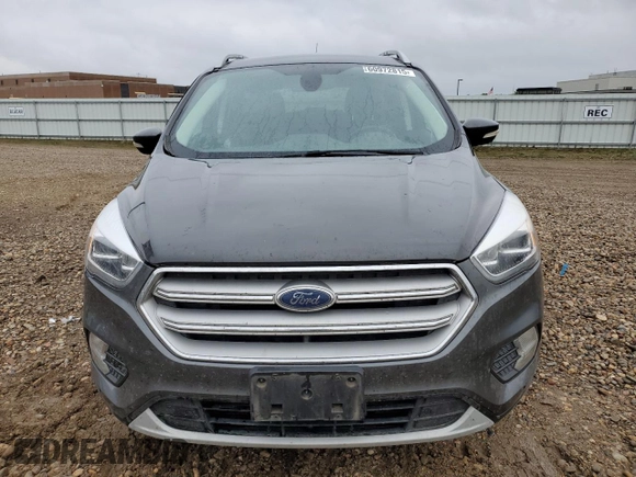 2019 Ford Escape Titanium z VIN 1FMCU9J99KUC31182, wystawiony jako Copart lot #60972815 z przebiegiem 94 464 mil mil oraz Szkoda całkowita • Salvage title. Historia ofert i sprzedaży dostępna na DreamBid. Obrazek 5.