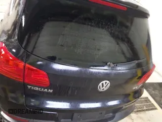 2013 Volkswagen Tiguan SE z VIN WVGBV7AX3DW508802, wystawiony jako IAAI lot #41471406 z przebiegiem 102 426 mil mil oraz . Historia ofert i sprzedaży dostępna na DreamBid. Obrazek 16.