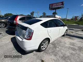 2007 Toyota Prius z VIN JTDKB20U477546822, wystawiony jako Copart lot #61691805 z przebiegiem 146 754 mil mil oraz Czysty tytuł • Clean title. Historia ofert i sprzedaży dostępna na DreamBid. Obrazek 4.