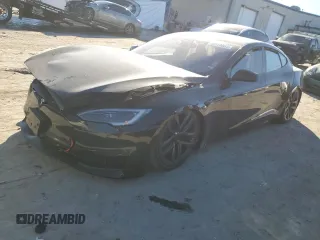 2023 Tesla Model S с VIN 5YJSA1E5XPF519570, выставлен на аукционе Copart как лот 80573863 с пробегом Не указан миль и Списание • Salvage title. История ставок и продаж доступна на DreamBid. Изображение 1.