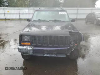 1999 Jeep Cherokee Sport with VIN 1J4FF68S6XL602177, listed as a Copart auction lot 51962355 with 176,386 mi miles and Salvage Title. Bid and sale history available at carsss.com. Image 5.