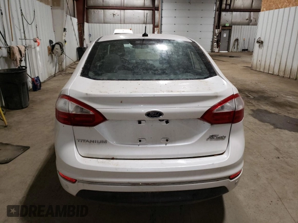 2016 Ford Fiesta Titanium z VIN 3FADP4CJ0GM167738, wystawiony jako Copart lot #57875245 z przebiegiem 159 230 mil mil oraz Czysty tytuł • Clean title. Historia ofert i sprzedaży dostępna na DreamBid. Obrazek 6.