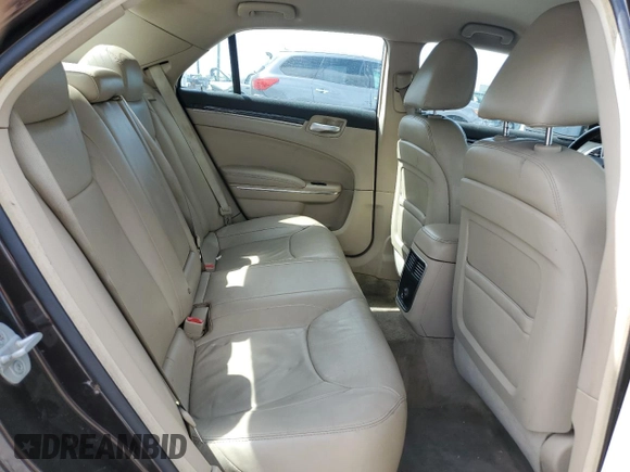 2012 Chrysler 300 Limited z VIN 2C3CCACG9CH173300, wystawiony jako Copart lot #52019775 z przebiegiem 128 492 mil mil oraz Szkoda całkowita • Salvage title. Historia ofert i sprzedaży dostępna na DreamBid. Obrazek 10.