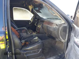 2014 Chevrolet Suburban LTZ with VIN 1GNSCKE08ER149268, listed as a IAAI auction lot 41625468 with Not provided miles and . Bid and sale history available at DreamBid. Image 5.