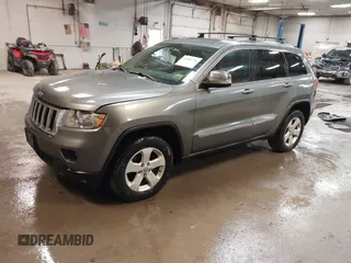 2011 Jeep Grand Cherokee Laredo with VIN 1J4RR4GG7BC578079, listed as a IAAI auction lot 42491750 with 197,581 mi miles and . Bid and sale history available at DreamBid. Image 18.