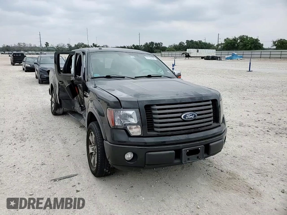 2012 Ford F-150 XL z VIN 1FTFW1CF0CFA70050, wystawiony jako Copart lot #57764625 z przebiegiem 167 943 mil mil oraz Szkody całkowita. Historia ofert i sprzedaży dostępna na DreamBid. Obrazek 13.