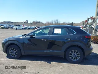 2021 Mazda CX-30 S with VIN 3MVDMBAL3MM214735, listed as a IAAI auction lot 42000096 with 46,794 mi miles and . Bid and sale history available at DreamBid. Image 14.