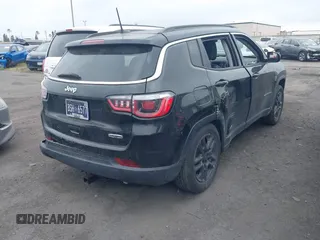 2020 Jeep Compass Latitude with VIN 3C4NJCBB8LT206001, listed as a IAAI auction lot 42352933 with 58,406 mi miles and . Bid and sale history available at DreamBid. Image 4.
