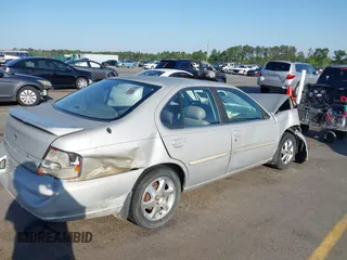 1999 Nissan Altima XE with VIN 1N4DL01D4XC252973, listed as a IAAI auction lot 42005504 with 247,570 mi miles. Bid and sale history available at carsss.com. Image 4.