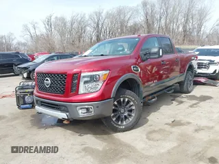 2016 Nissan Titan XD S with VIN 1N6AA1F43GN510841, listed as a IAAI auction lot 41814864 with 163,025 mi miles. Bid and sale history available at carsss.com. Image 2.