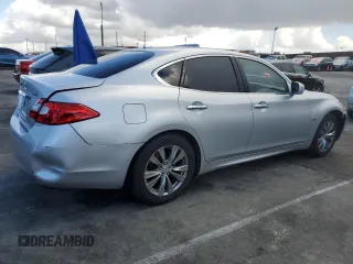 2012 Infiniti M Hybrid with VIN JN1EY1AP3CM910631, listed as a Copart auction lot 49162705 with 128,771 mi miles and Salvage title. Bid and sale history available at DreamBid. Image 3.