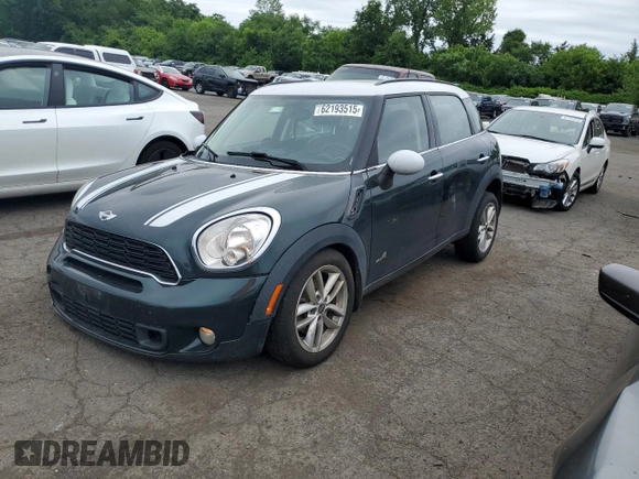 2014 MINI Countryman S with VIN WMWZC5C58EWP39797, listed as a Copart auction lot 62193515 with 84,989 mi miles and Salvage title. Bid and sale history available at DreamBid. Image 1.