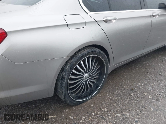2012 BMW 7 Series 750i with VIN WBAKA8C50CDX01319, listed as a IAAI auction lot 42133359 with 168,986 mi miles and . Bid and sale history available at DreamBid. Image 6.