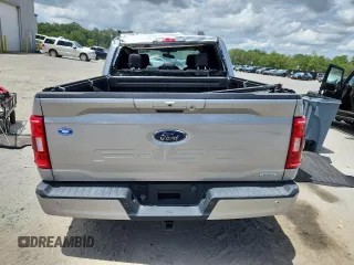 2021 Ford F-150 XL with VIN 1FTFW1E84MKD35382, listed as a Copart auction lot 63413675 with Not provided miles and Salvage title. Bid and sale history available at DreamBid. Image 6.