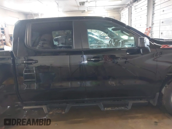 2019 Chevrolet Silverado 1500 RST with VIN 3GCUYEED9KG133843, listed as a IAAI auction lot 41848649 with 57,066 mi miles and . Bid and sale history available at DreamBid. Image 13.