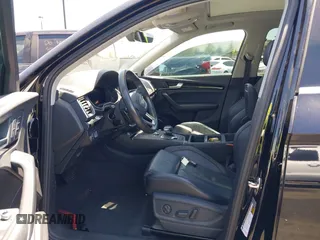 2018 Audi Q5 Premium Plus z VIN WA1BNAFY7J2094777, wystawiony jako IAAI lot #42265300 z przebiegiem Nie podano mil oraz . Historia ofert i sprzedaży dostępna na DreamBid. Obrazek 5.