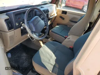 2002 Jeep Wrangler Sahara with VIN 1J4FA59S22P704603, listed as a Copart auction lot 77554334 with 99,758 mi miles and Salvage Title. Bid and sale history available at carsss.com. Image 8.
