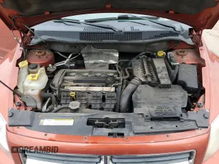 2010 Dodge Caliber Mainstreet z VIN 1B3CB3HA5AD591279, wystawiony jako Copart lot #57794645 z przebiegiem 200 007 mil mil oraz Szkoda całkowita • Salvage title. Historia ofert i sprzedaży dostępna na DreamBid. Obrazek 11.
