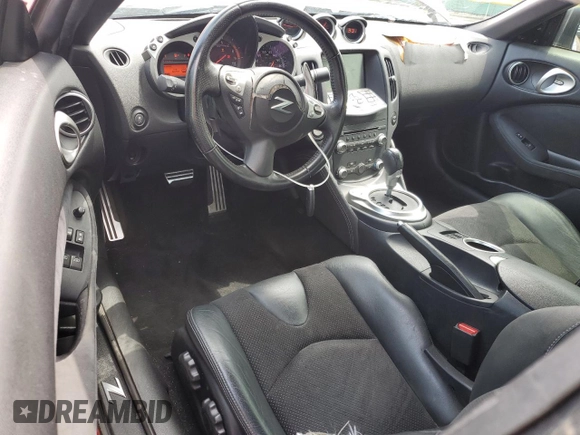 2013 Nissan 370Z Touring z VIN JN1AZ4EH9DM381350, wystawiony jako Copart lot #59375295 z przebiegiem 100 832 mil mil oraz Czysty tytuł • Clean title. Historia ofert i sprzedaży dostępna na DreamBid. Obrazek 8.