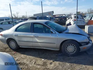 1996 Mercury Sable GS with VIN 1MELM50U5TA633365, listed as a IAAI auction lot 41723519 with 144,067 mi miles. Bid and sale history available at carsss.com. Image 13.
