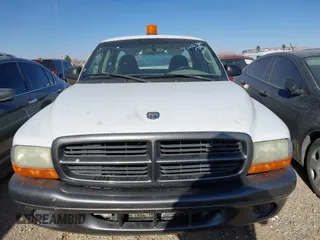 2002 Dodge Dakota with VIN 1B7GL12X32S701273, listed as a IAAI auction lot 41552573 with 157,212 mi miles and . Bid and sale history available at carsss.com. Image 11.
