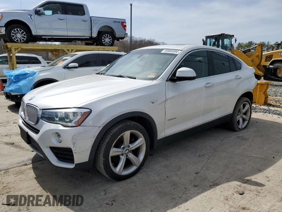 2015 BMW X4 xDrive28i with VIN 5UXXW3C59F0F89517, listed as a Copart auction lot 49989304 with 65,554 mi miles. Bid and sale history available at carsss.com. Image 1.