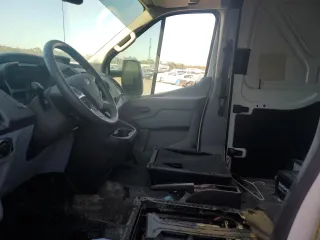 2015 Ford Transit with VIN 1FTSW2XG7FKA57802, listed as a Copart auction lot 74132384 with Not Provided miles and Salvage Title. Bid and sale history available at DreamBid. Image 7.