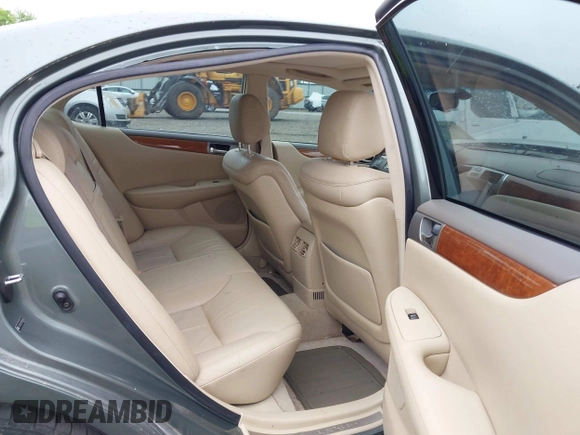 2005 Lexus ES 350 z VIN JTHBA30G055056646, wystawiony jako IAAI lot #42288911 z przebiegiem 173 017 mil mil oraz . Historia ofert i sprzedaży dostępna na DreamBid. Obrazek 8.