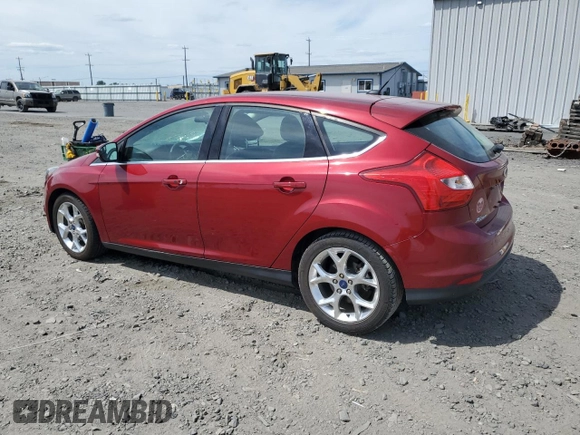 2014 Ford Focus Titanium with VIN 1FADP3N21EL421469, listed as a Copart auction lot 59744685 with 68,436 mi miles and Salvage title. Bid and sale history available at DreamBid. Image 2.