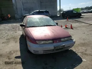 1997 Saturn SL with VIN 1G8ZF5285VZ412630, listed as a Copart auction lot 74937694 with 165,371 mi miles and Salvage Title. Bid and sale history available at carsss.com. Image 10.