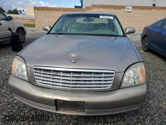 2001 Cadillac DeVille z VIN 1G6KD54Y61U248616, wystawiony jako Copart lot #47057095 z przebiegiem 110 009 mil mil oraz Czysty tytuł • Clean title. Historia ofert i sprzedaży dostępna na DreamBid. Obrazek 5.